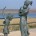 Bronze Statue of Family Waving Goodbye