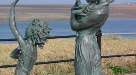 Bronze Statue of Family Waving Goodbye