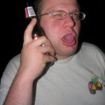 Jeff.net Party 2006 - DJ digitalflood phones home (Photo by DJ SlipK)