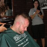 DJ digitalflood getting his head shaved.