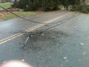 Downed Power Line in Warwick NY-- note the burn marks and hole in the pavement from the current.