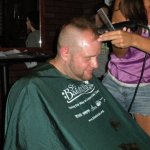DJ digitalflood getting his head shaved.